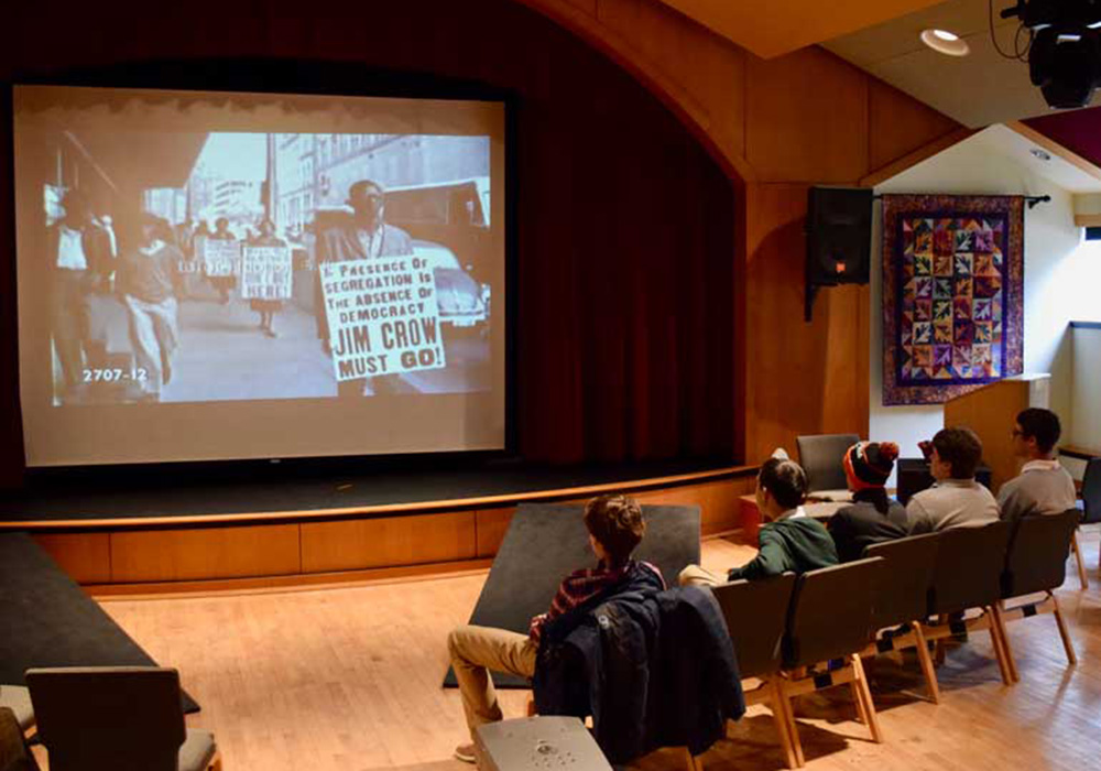 students watching a presentation in the Abigail J. Woodhall Performing Arts Center