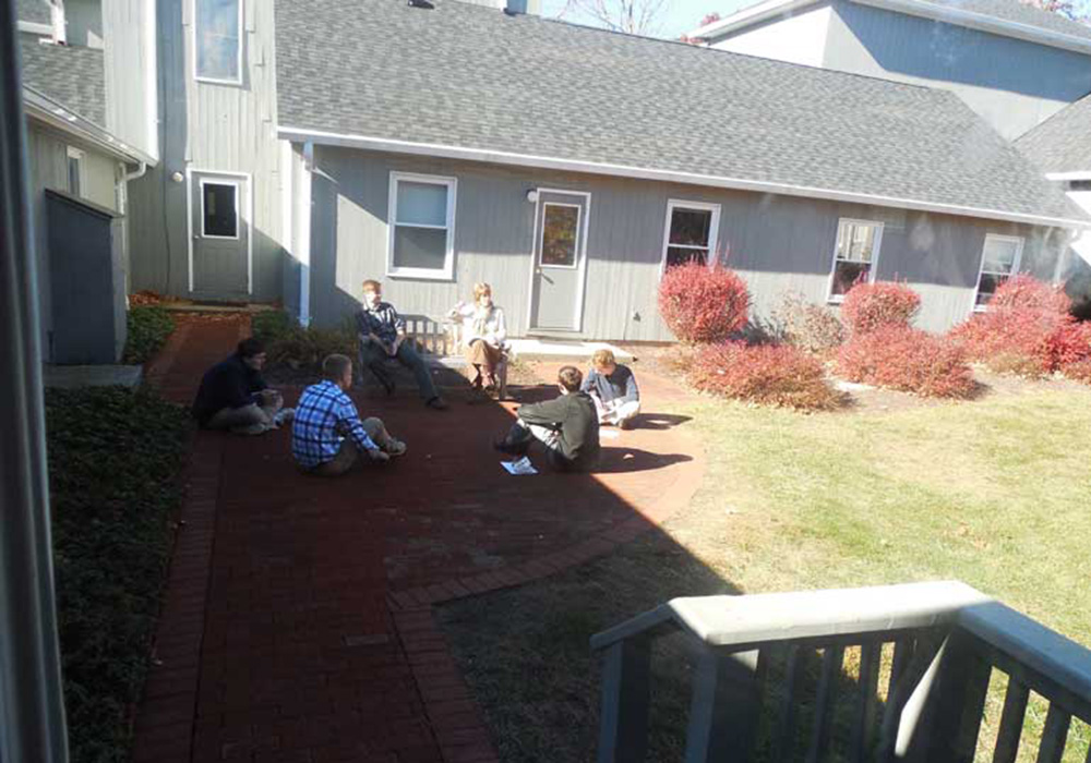 students in Tower Dormitory courtyard