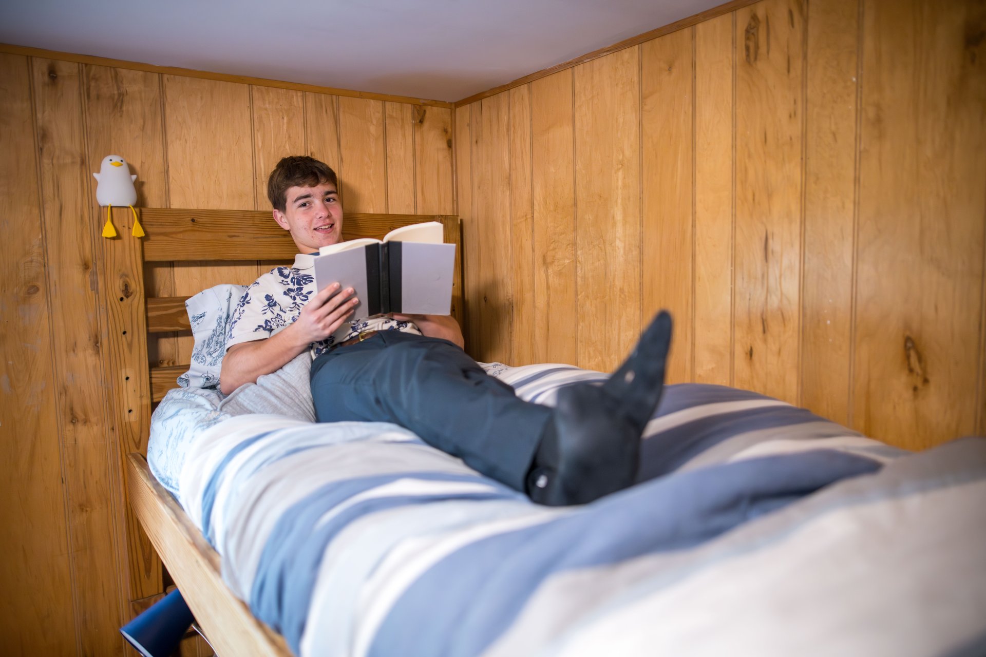 student in dorm room